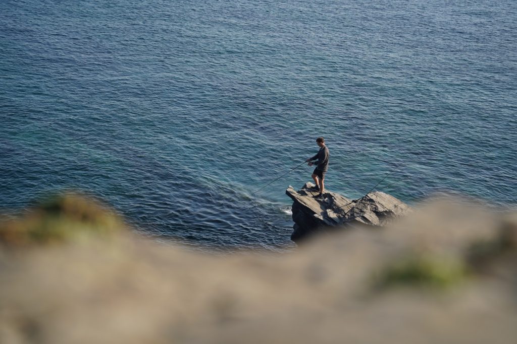 bass fishing from the rocks 